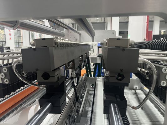 High Efficient Automatic Foam hot melt adhesive Intermittent Gluing and Wave Receiving Production Line